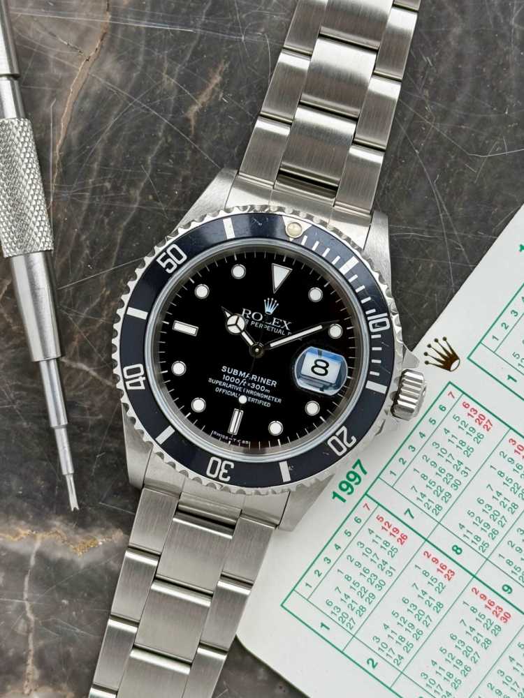 Featured image for Rolex Submariner 16610 Black 1997 with original box and papers