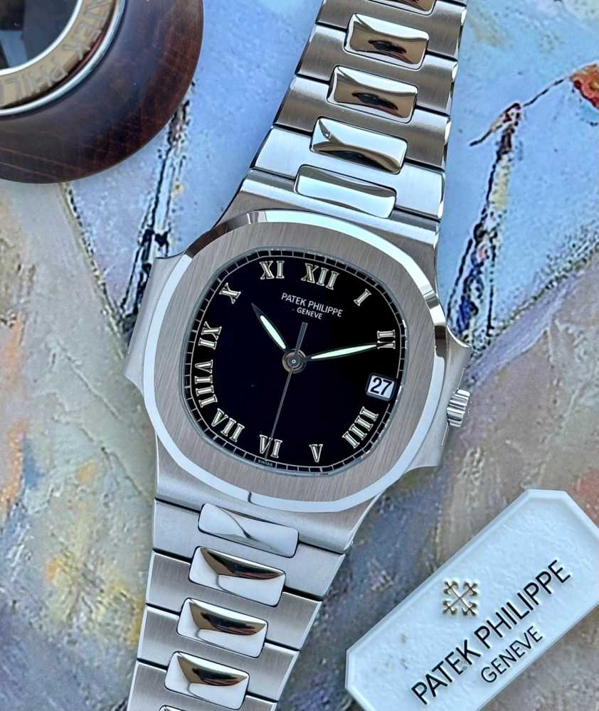 Featured image for Patek Philippe Nautilus 3800 Black 2002 with original box and papers 2