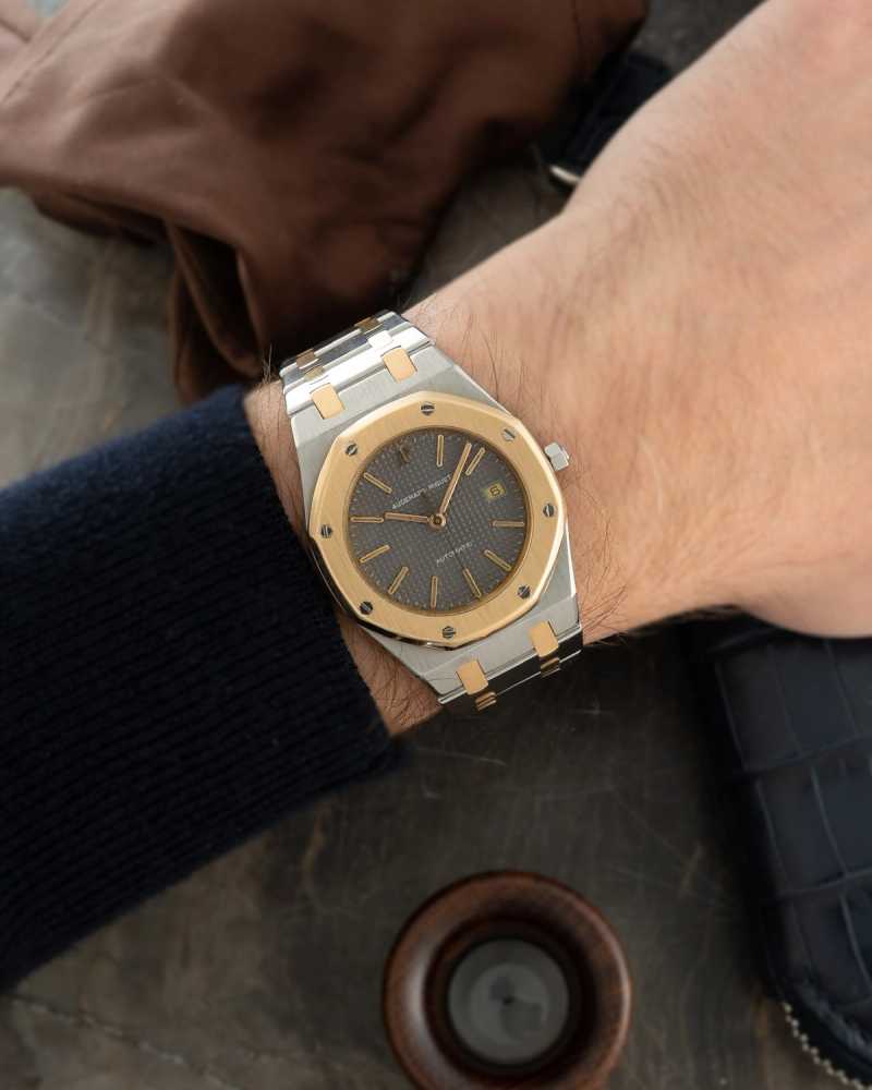 Wrist shot image for Audemars Piguet Royal Oak 14486 SA Grey 1990 with original box and papers