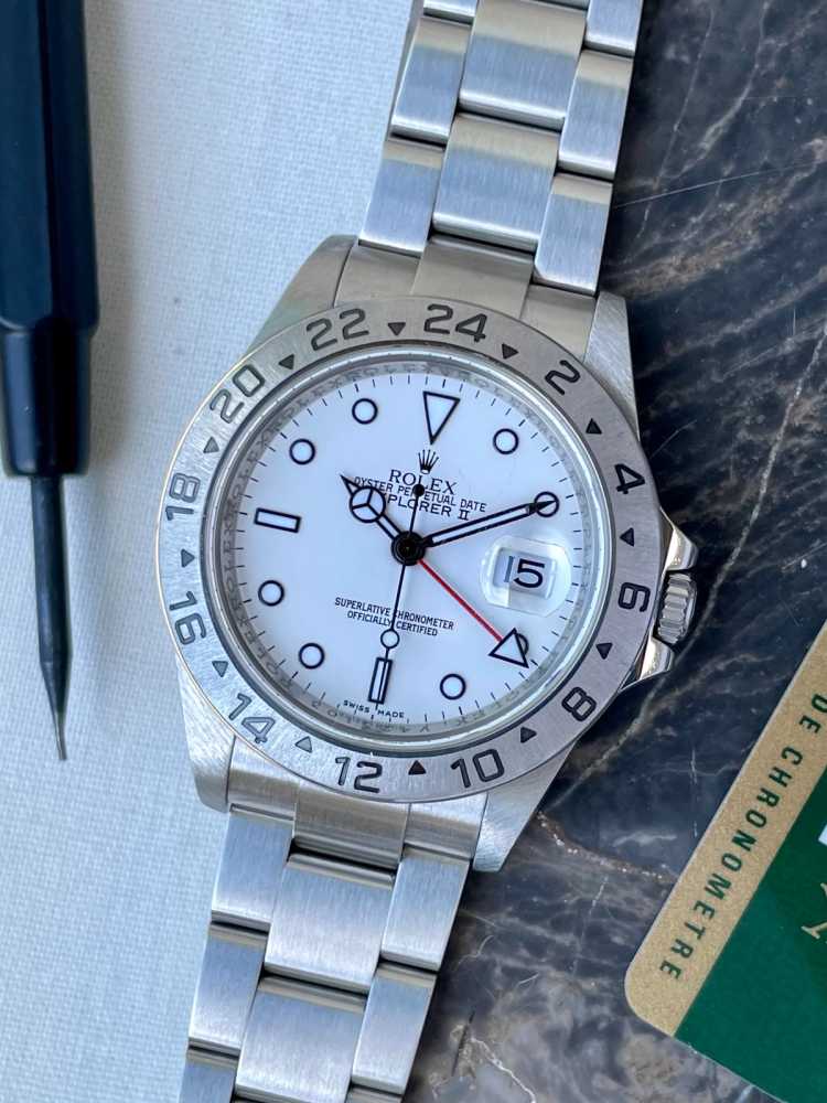 Featured image for Rolex Explorer 2 "Engraved Rehaut" 16570T White 2010 with original box and papers