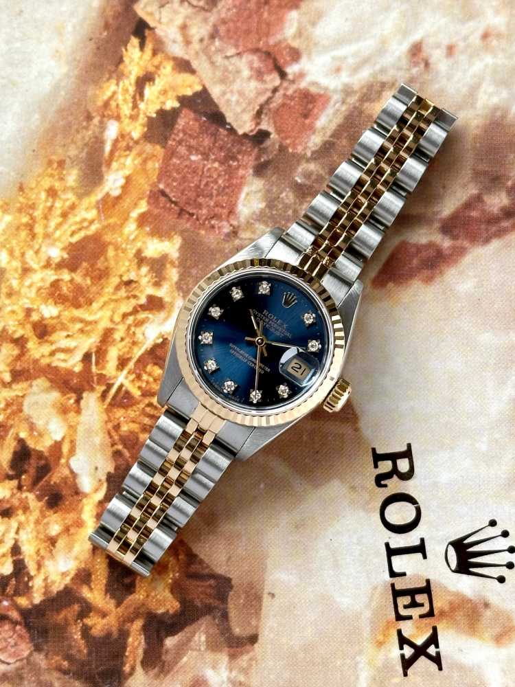 Wrist image for Rolex Lady-Datejust "Diamond" 69173G Blue 1991 with original box and papers