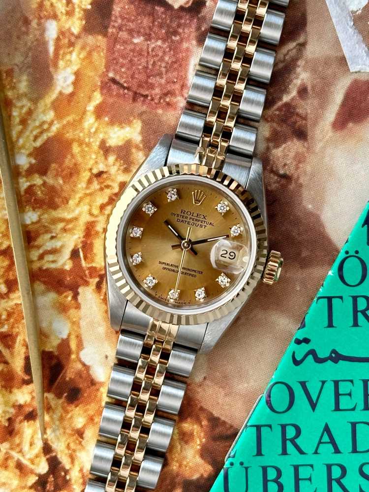 Featured image for Rolex Lady-Datejust "Diamond" 69173G Gold 1991 with original box and papers 4