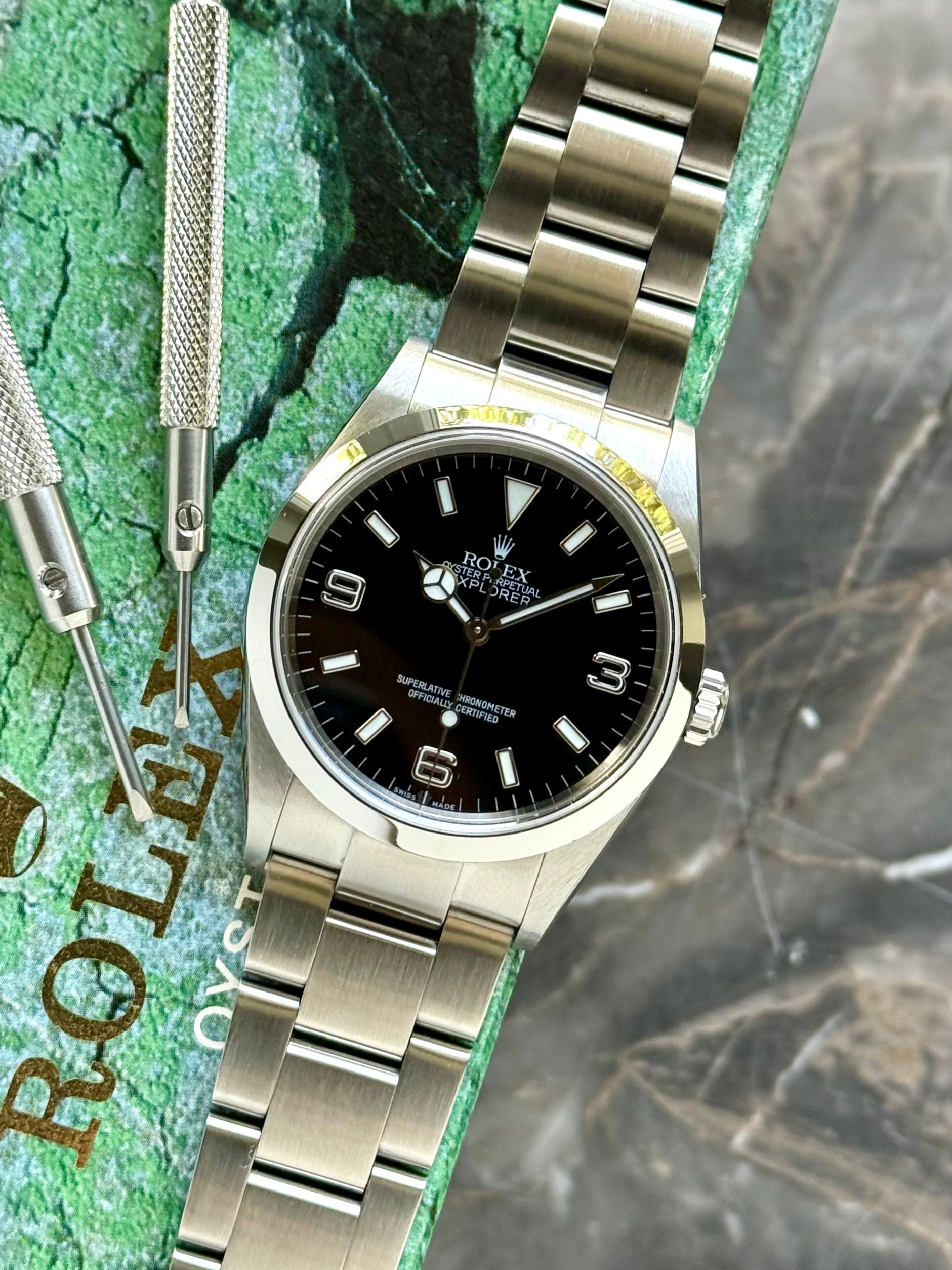 Rolex Explorer 114270 Black 2004 with original box and papers 2