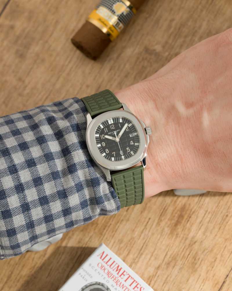 Wrist shot image for Patek Philippe Aquanaut 5064A Black 2001 with original box and papers