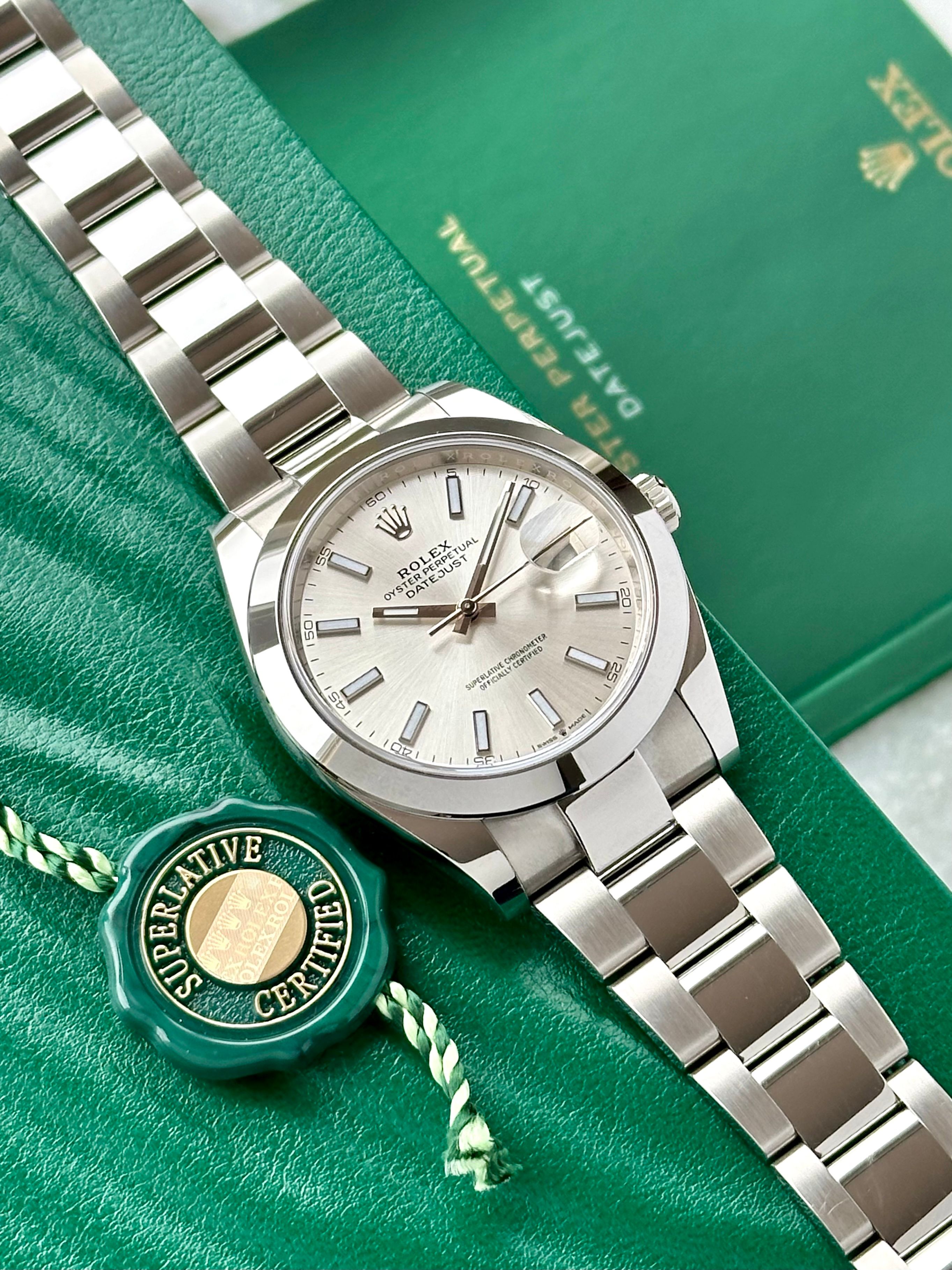 Rolex Datejust 126300 Silver 2021 with original box and papers