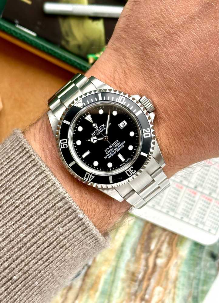 Wrist shot image for Rolex Sea-Dweller 16600 T Black 2004 with original box and papers