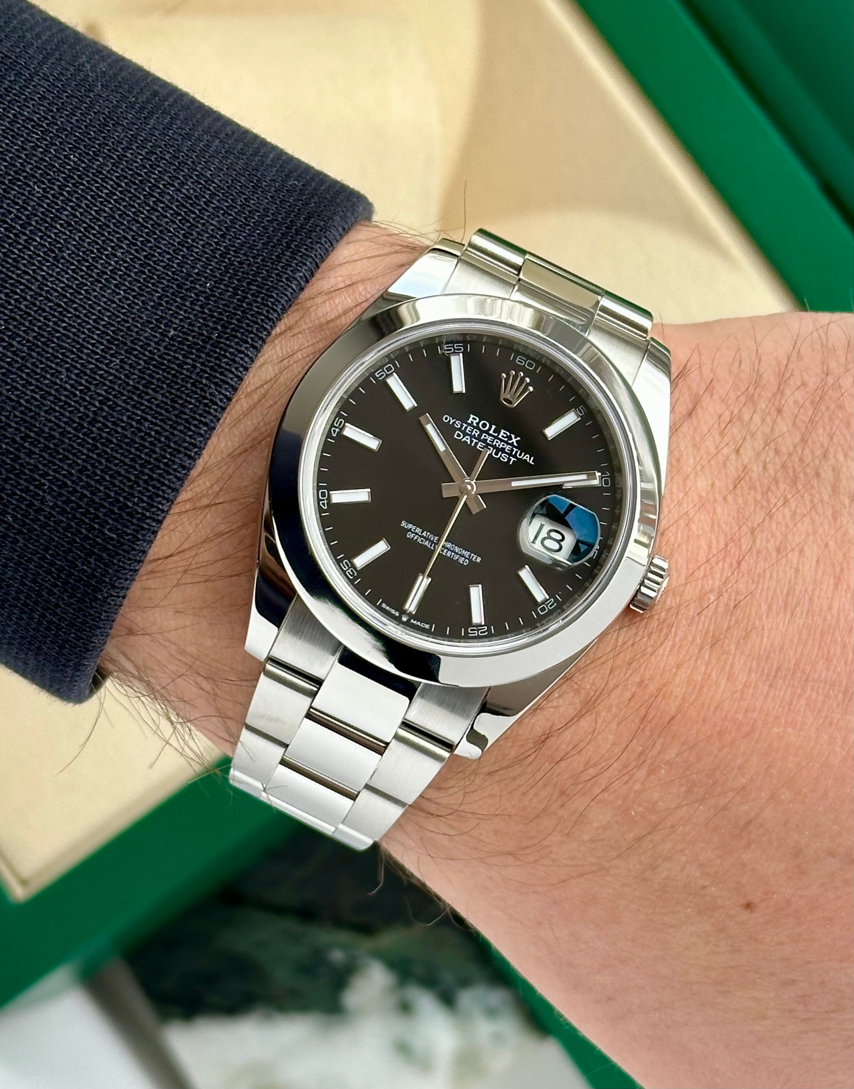 Rolex Datejust 126300 Black 2020 with original box and papers