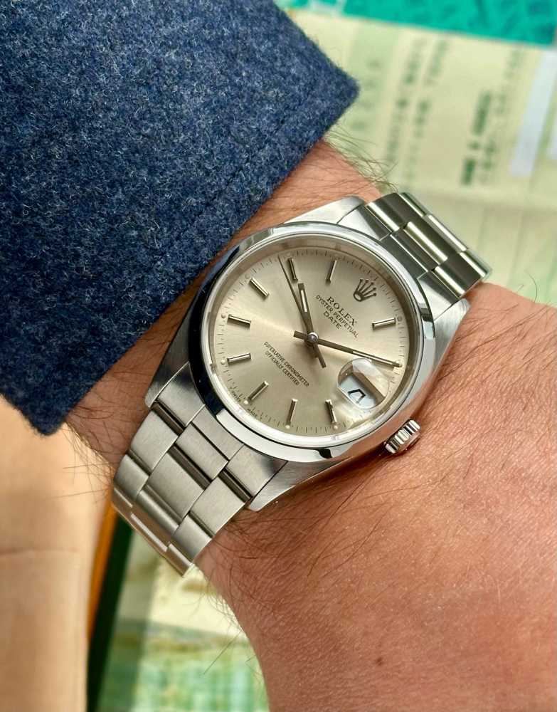 Wrist shot image for Rolex Oyster Perpetual Date 15200 Silver 1990 with original box and papers