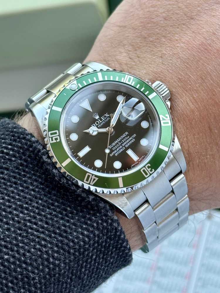 Wrist shot image for Rolex Submariner "Kermit" 16610LV Black 2006 with original box and papers