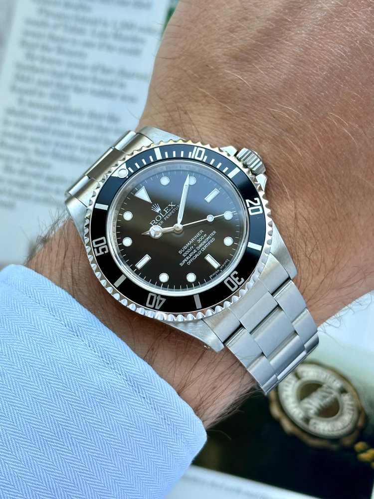 Rolex Submariner 14060M Black 2009 with original box and papers