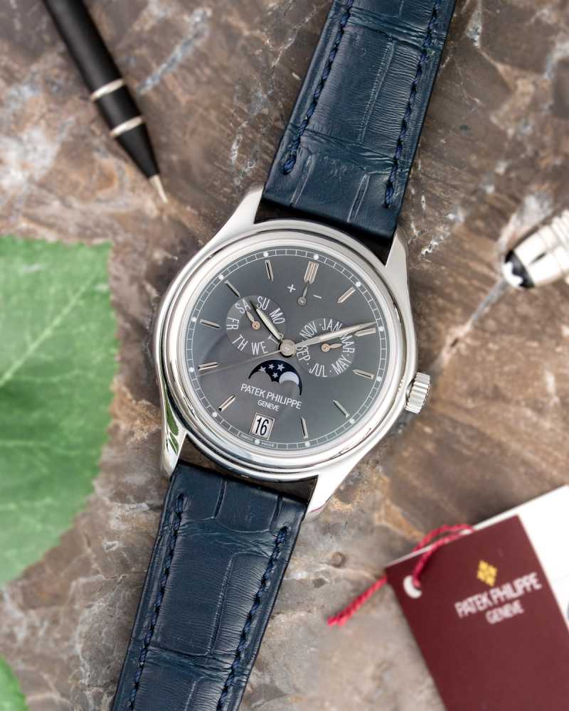 Featured image for Patek Philippe Annual Calendar “PATEK SERVICE +FULL SET” 5146P Grey 2011 with original box and papers