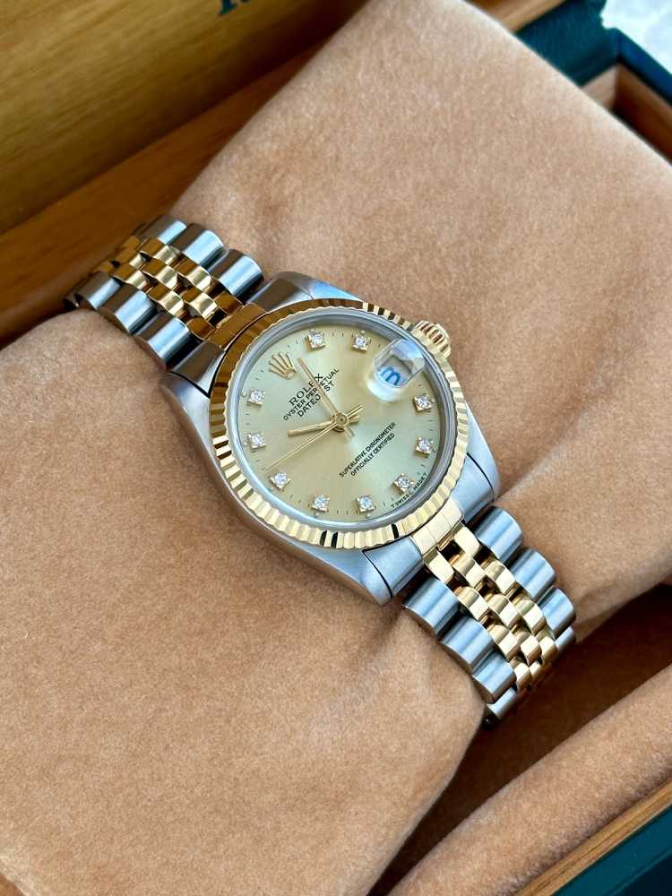Wrist shot image for Rolex Midsize Datejust "Diamond" 68273G Gold 1996 with original box and papers