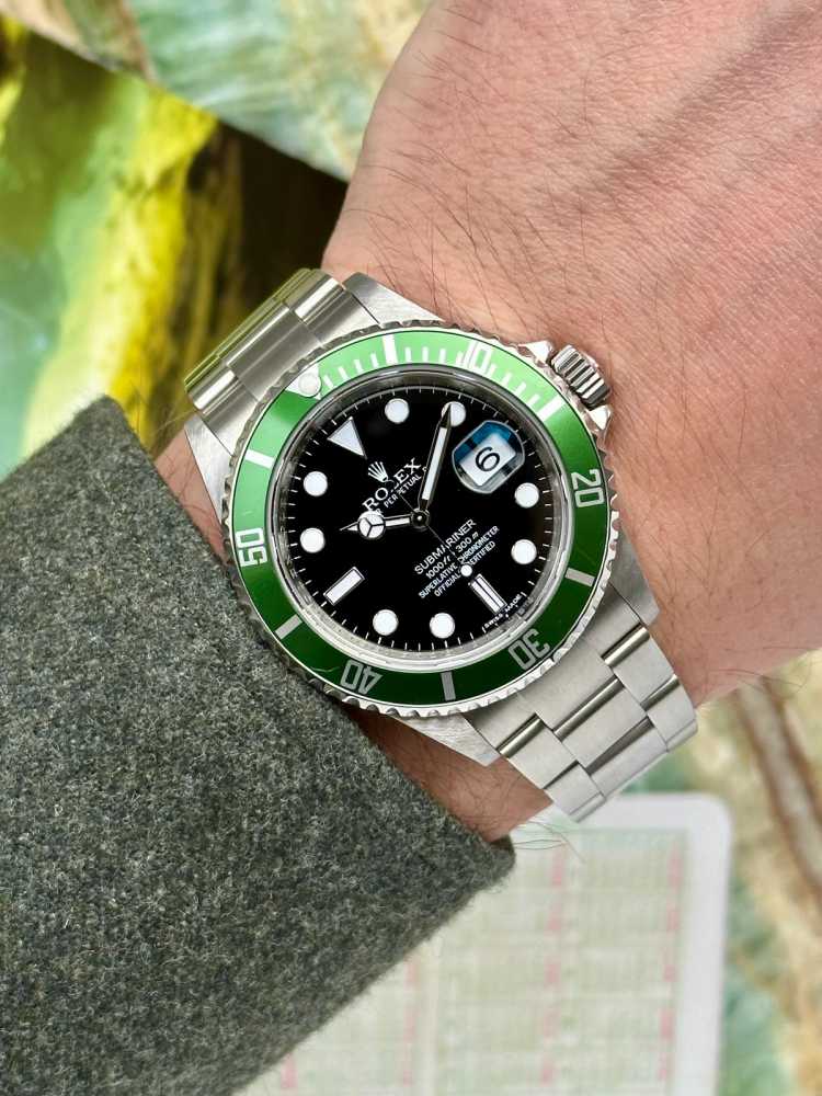 Wrist shot image for Rolex Submariner LV "Engraved Rehaut" 16610LV Black 2009 with original box and papers