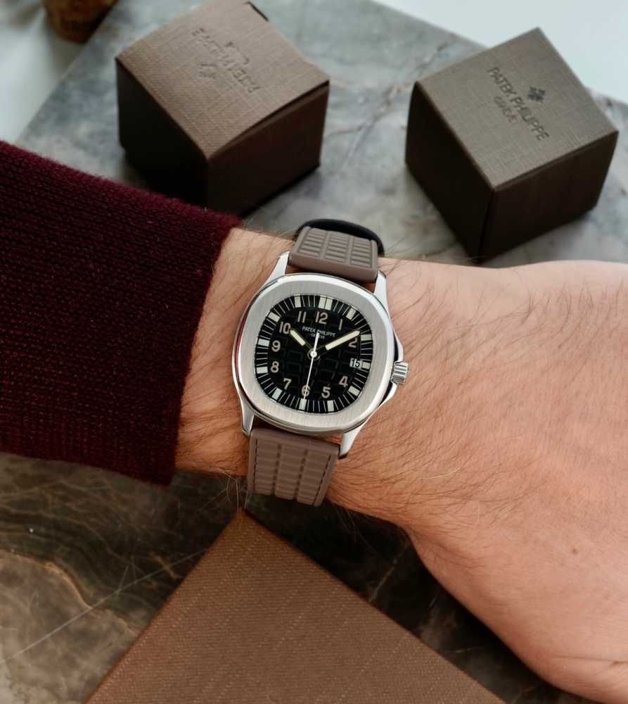Wrist shot image for Patek Philippe Aquanaut "PATEK SERVICE" 5064A Black 2003 with original box and papers