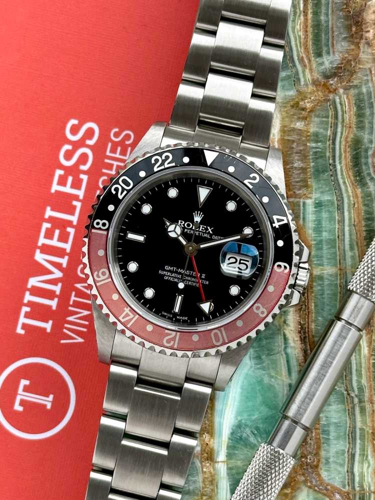 Featured image for Rolex GMT-Master II "Coke" 16710 Black 2001 with original box and papers 2