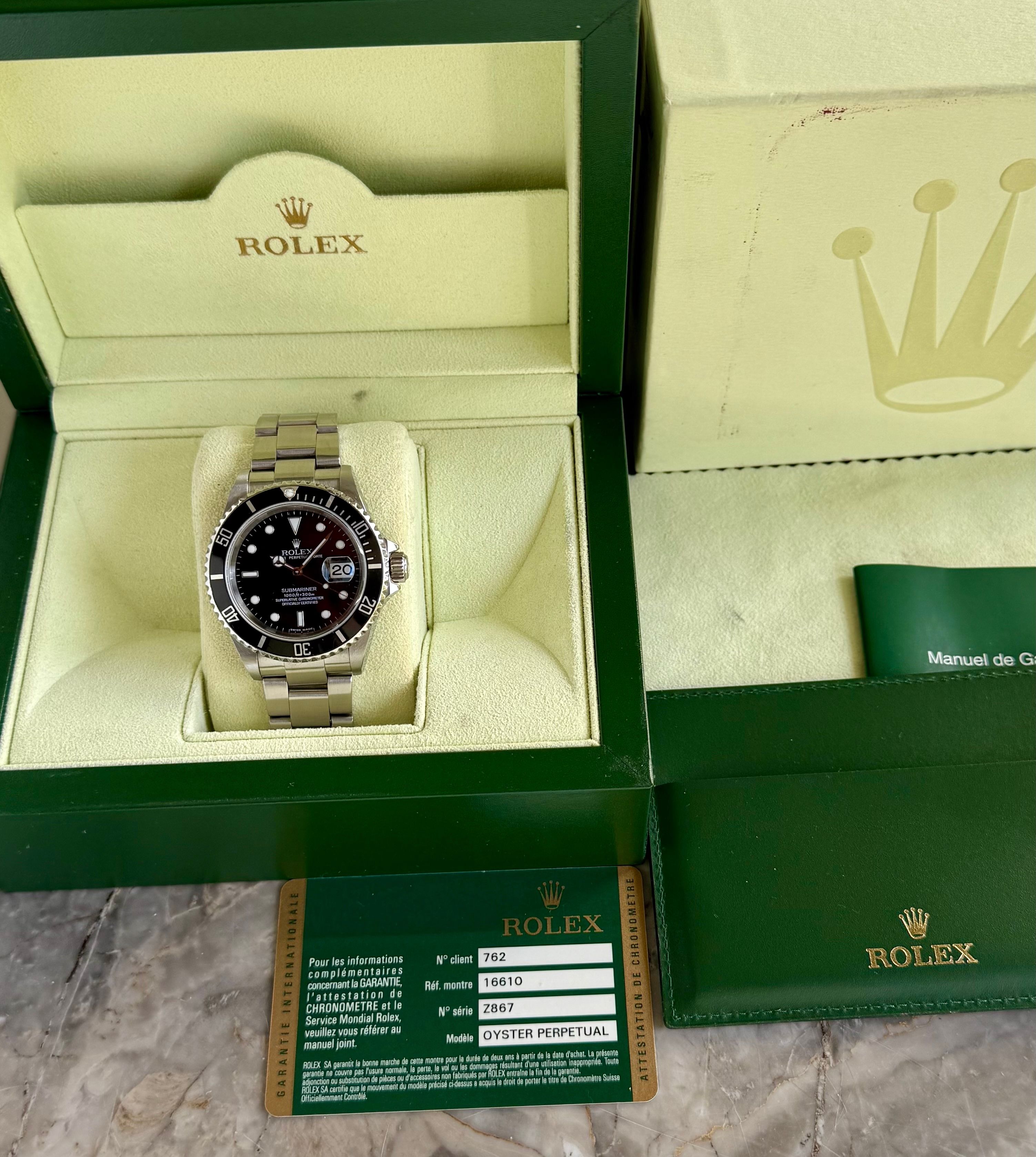 Rolex Submariner 16610 Black 2007 with original box and papers