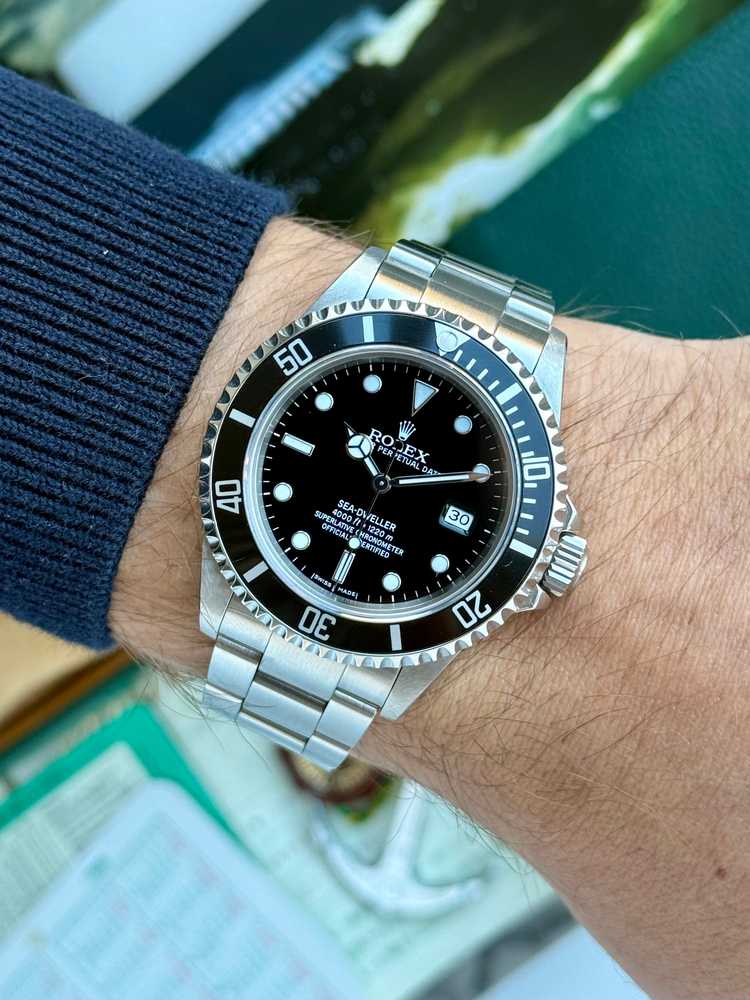 Wrist shot image for Rolex Sea-Dweller "Triple Six" 16660 Black 1984 with original box and papers