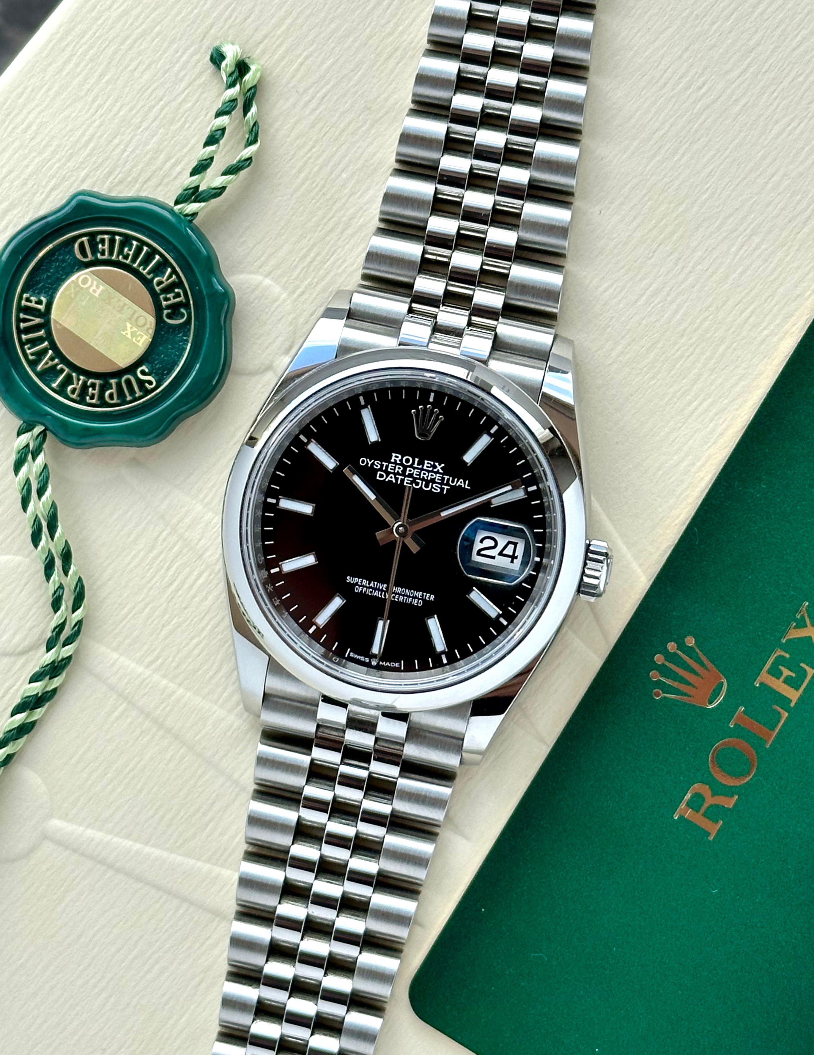 Rolex Datejust 126200 Black 2022 with original box and papers