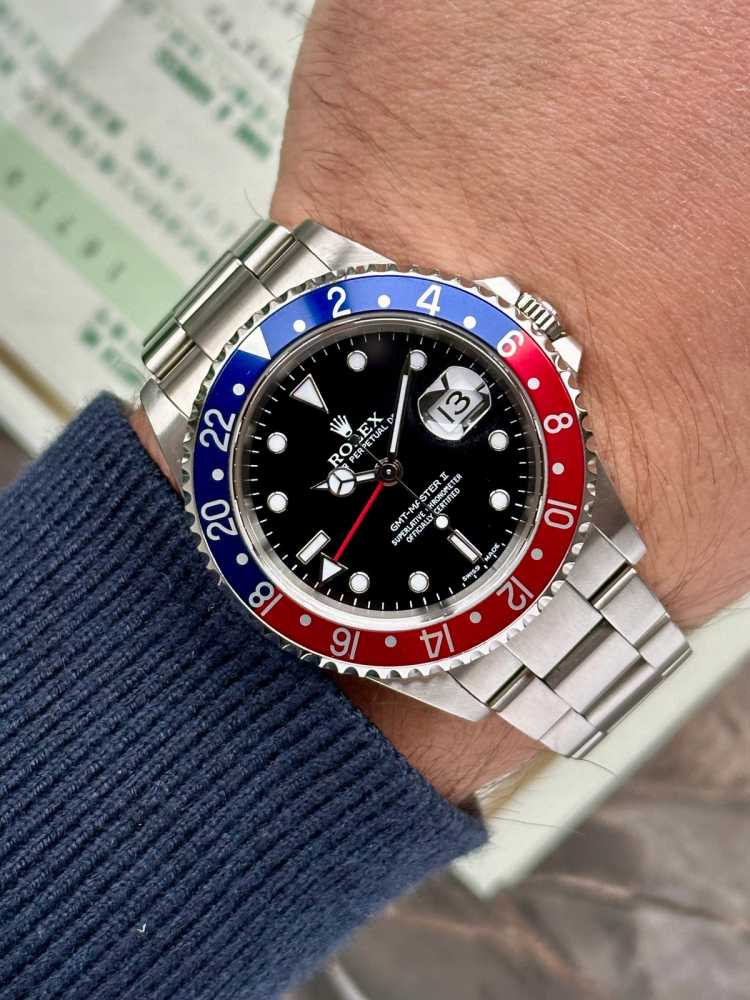 Wrist shot image for Rolex GMT-Master II "Pepsi" 16710 Black 1999 with original box and papers