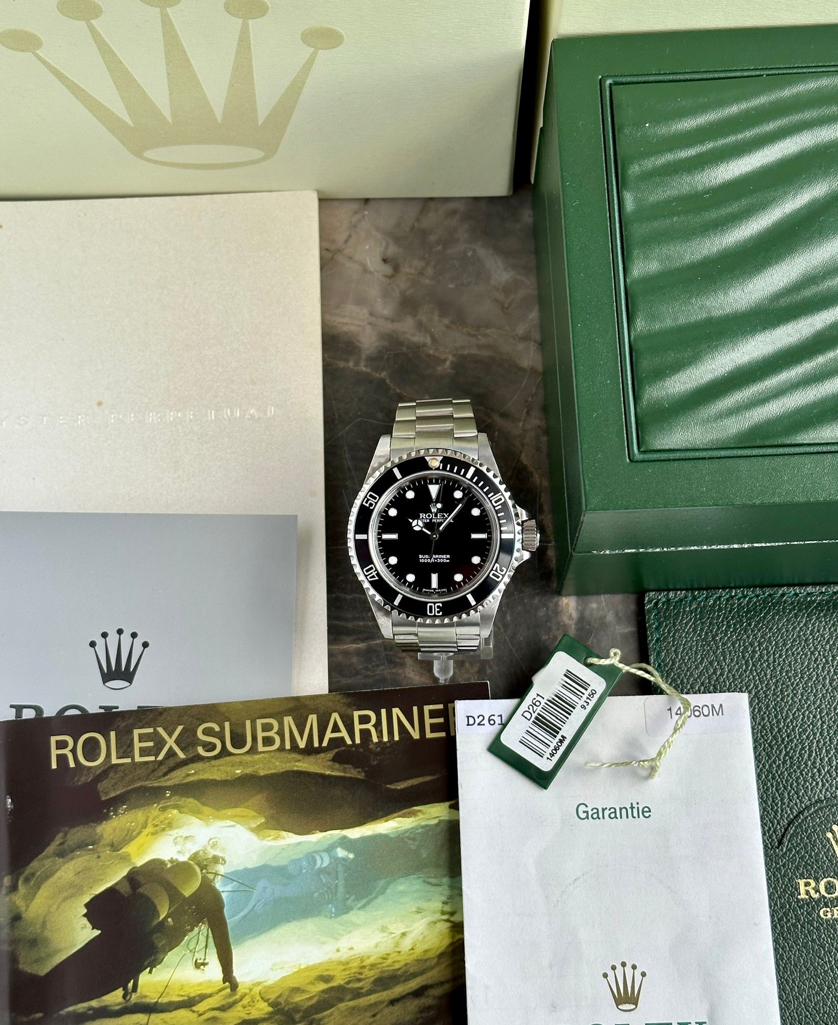 Rolex Submariner 14060M Black 2005 with original box and papers