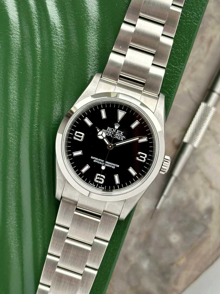 Featured image for Rolex Explorer 1 "Engraved Rehaut" 114270 Black 2008 with original box and papers 2