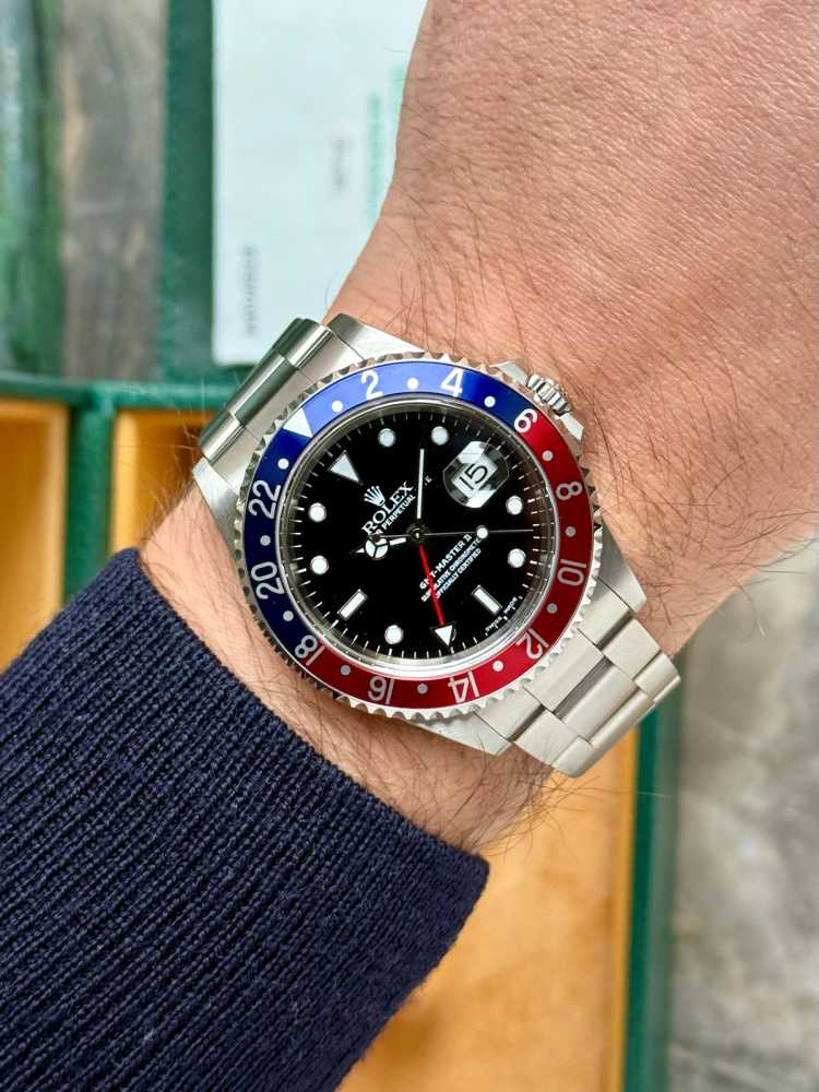 Wrist shot image for Rolex GMT-Master II "Pepsi" 16710 Black 1999 with original box and papers 3