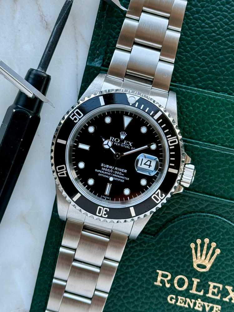 Featured image for Rolex Submariner "Swiss" 16610 Black 1999 with original box and papers 2