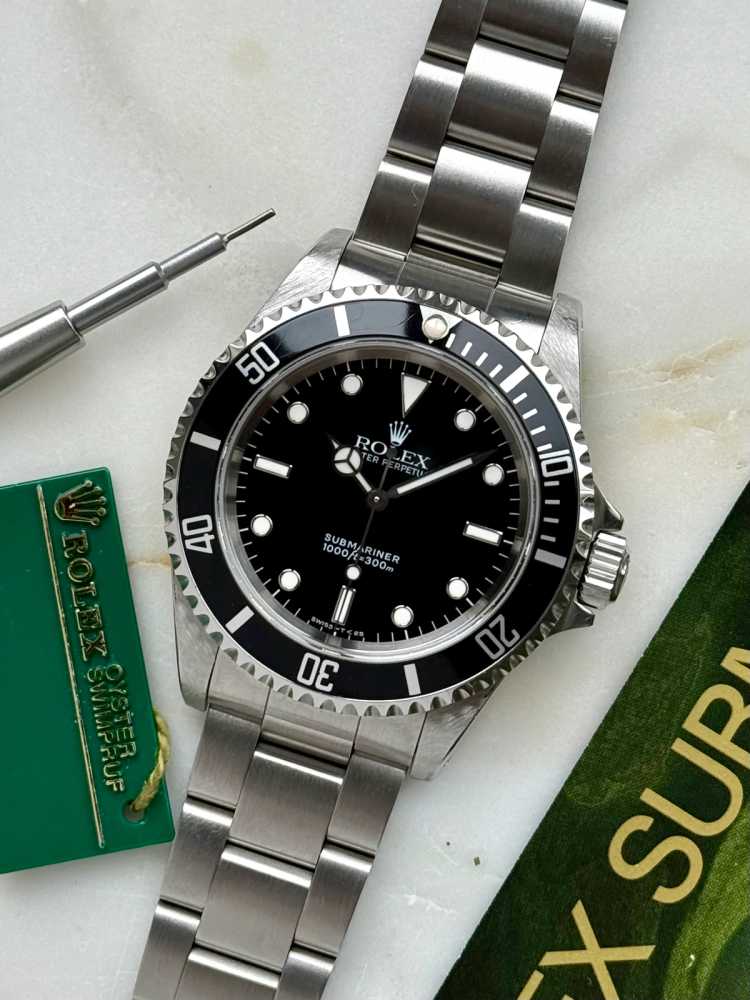 Featured image for Rolex Submariner 14060 Black 1993 with original box and papers 2