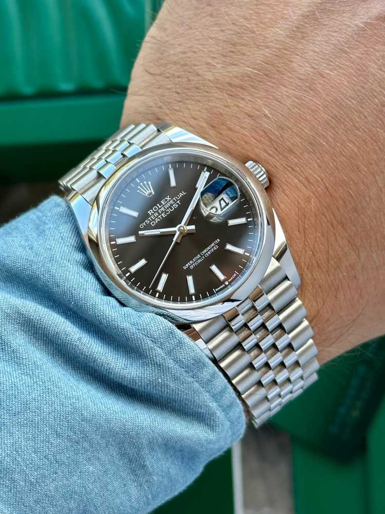 Wrist image for Rolex Datejust 126200 Black 2022 with original box and papers