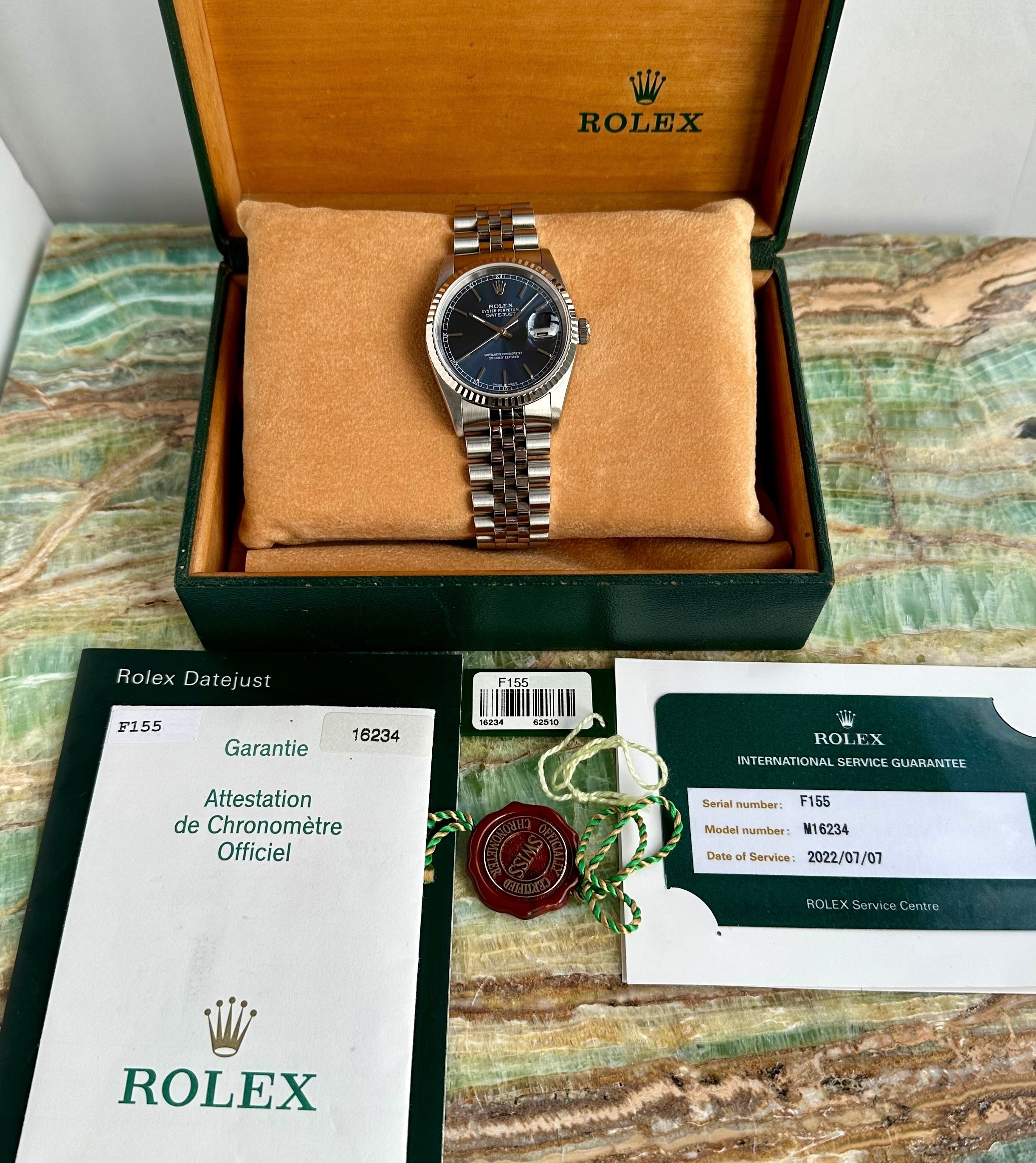 Rolex Datejust 16234 Blue 2004 with original box and papers