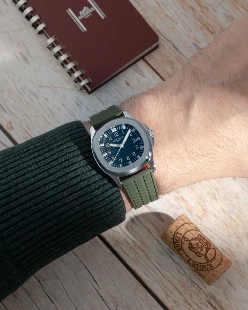 Wrist shot image for Patek Philippe Aquanaut 5066a Black 2005 with original box and papers