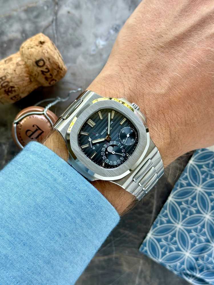 Wrist shot image for Patek Philippe Nautilus 5712 Blue 2006 with original box and papers