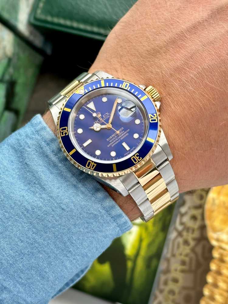 Wrist image for Rolex Submariner 16613 Blue 1999 with original box and papers