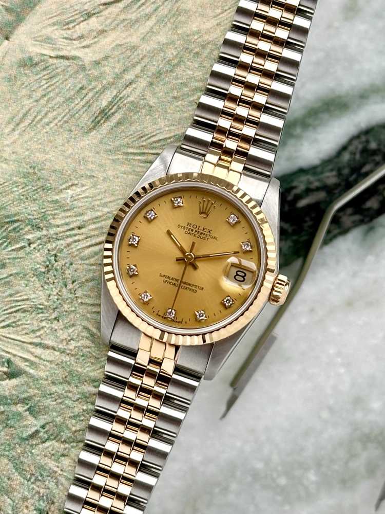 Featured image for Rolex Midsize Datejust "Diamond" 68273G Gold 1993 with original box and papers 2