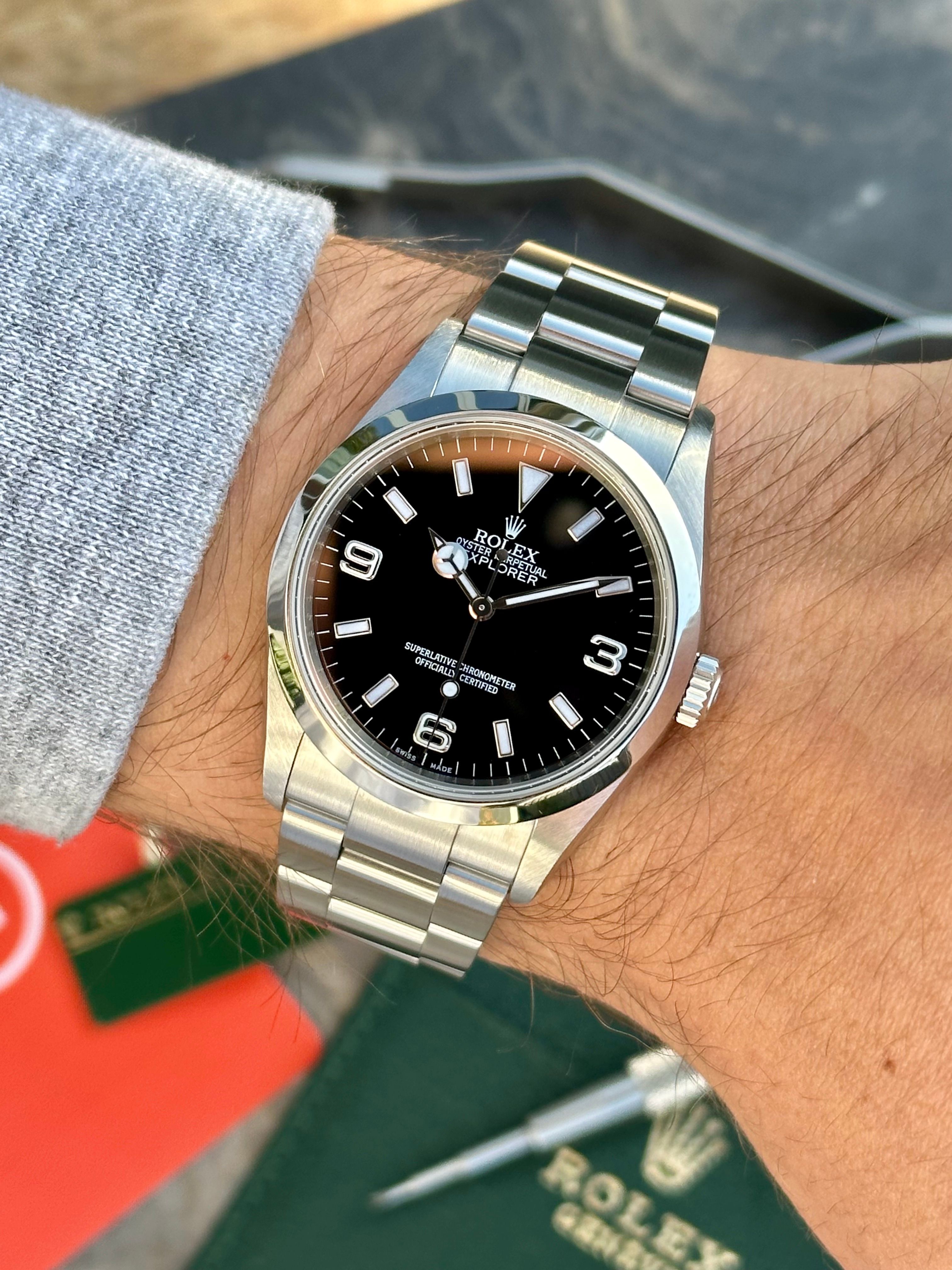 Rolex Explorer I 114270 Black 2007 with original box and papers