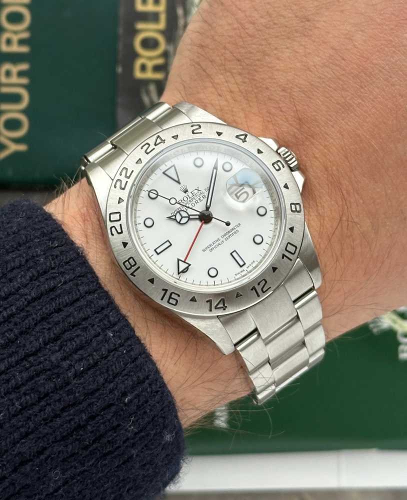 Wrist image for Rolex Explorer 2 "Engraved Rehaut" 16570T White 2008 with original box and papers 2