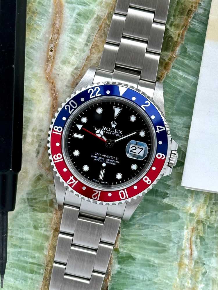 Featured image for Rolex GMT-Master II "Pepsi" 16710 Black 2001 with original box and papers 2