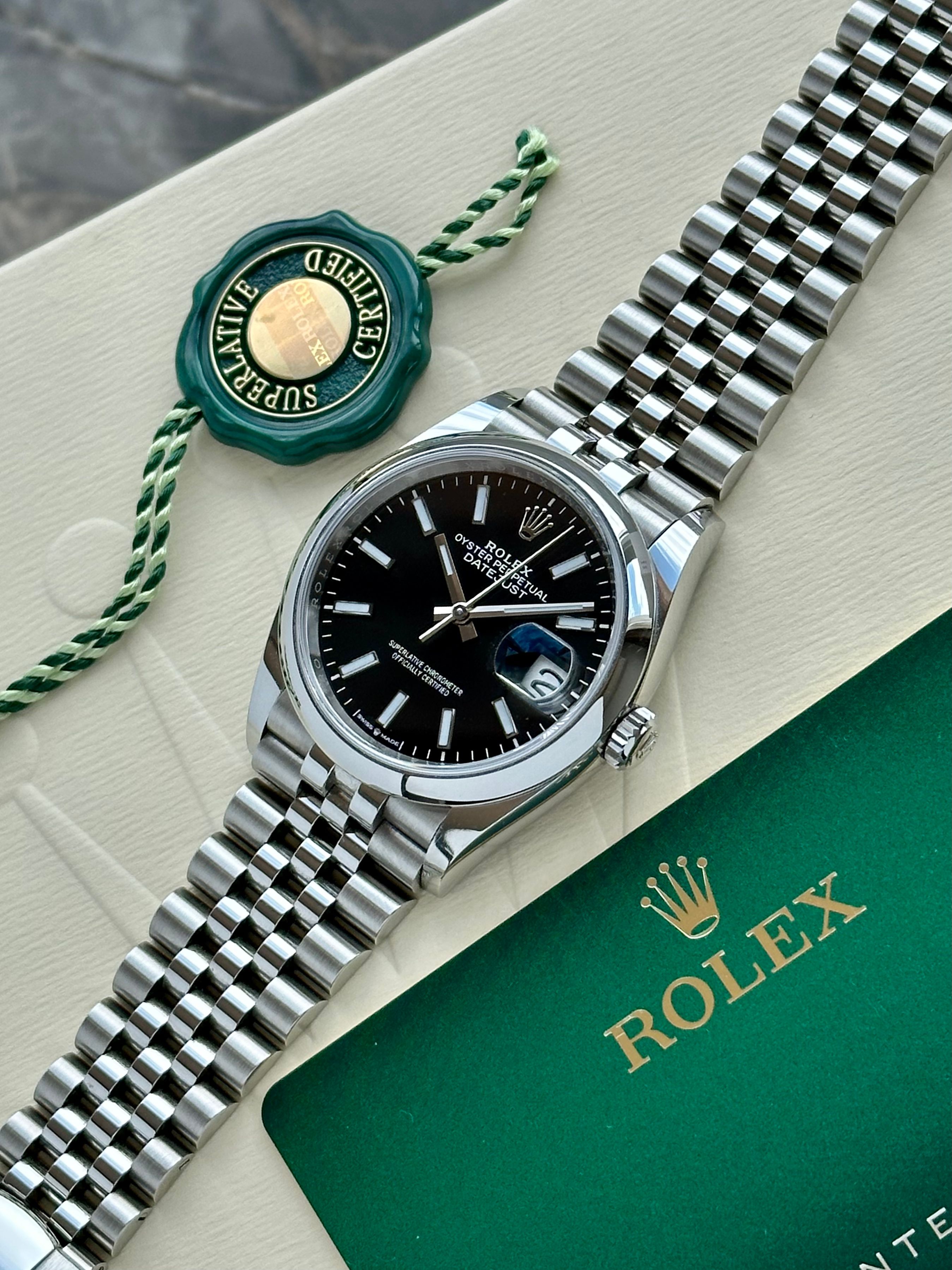 Rolex Datejust 126200 Black 2022 with original box and papers