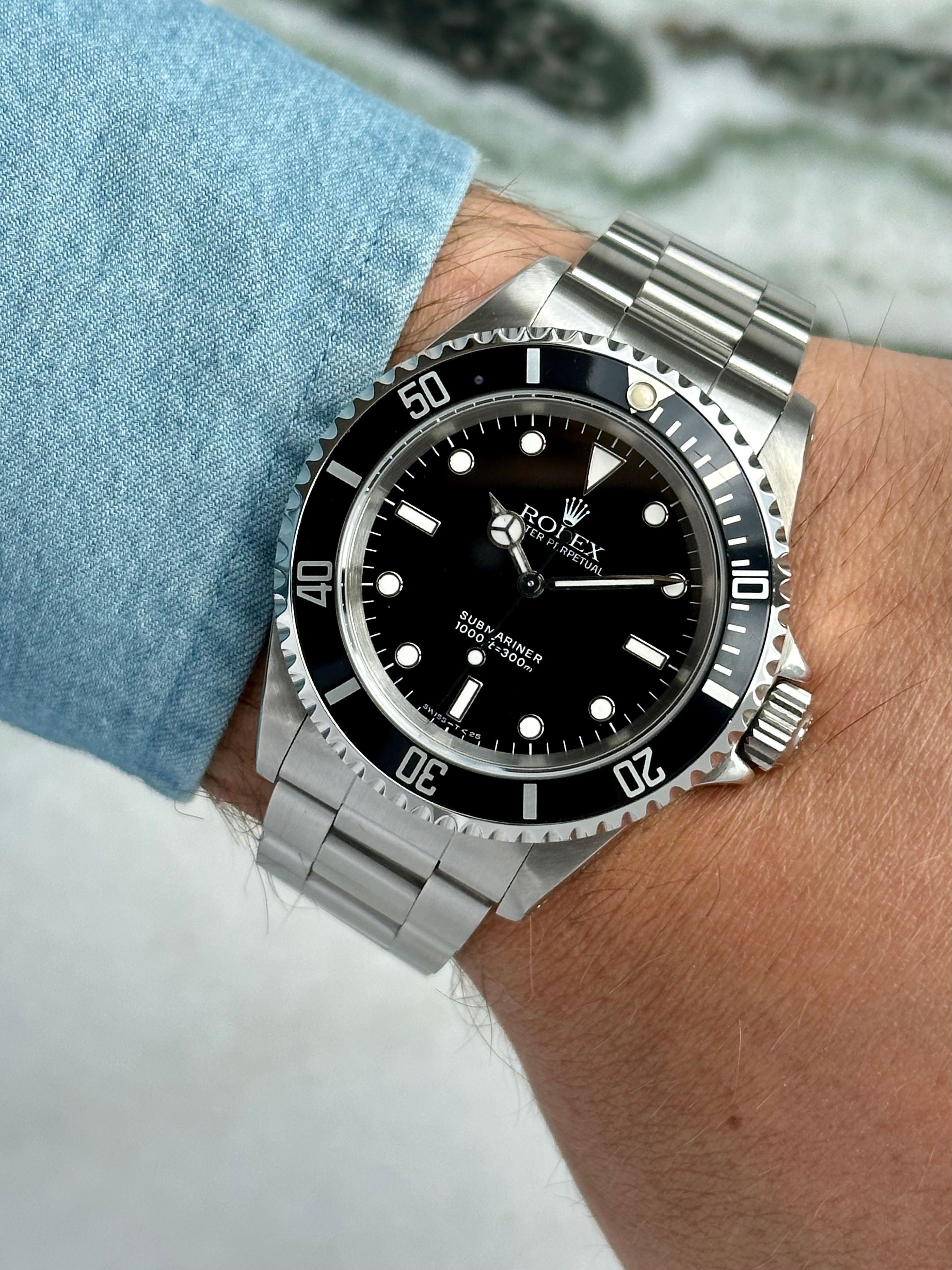 Rolex Submariner 14060 Black 1991 with original box and papers