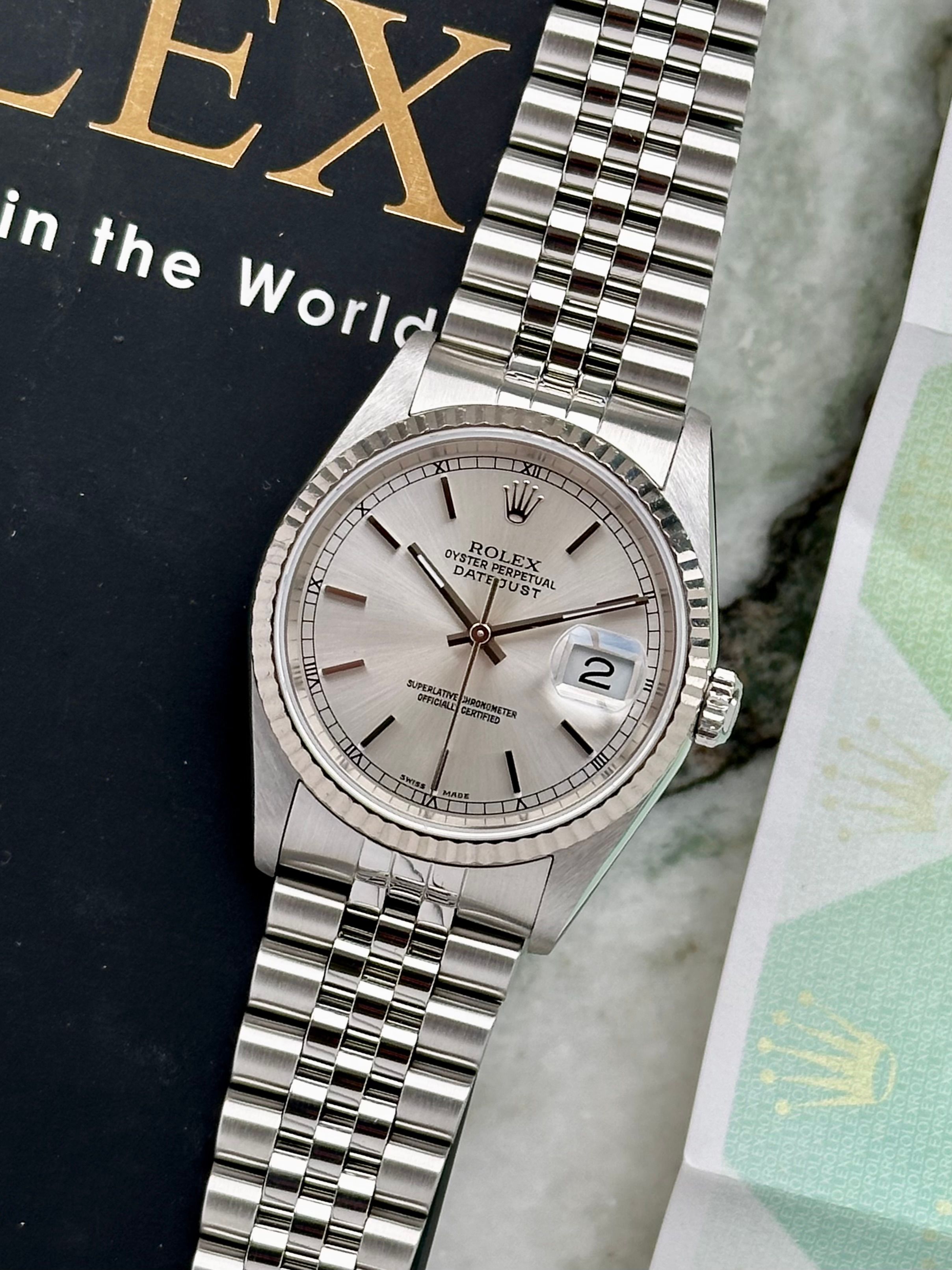Rolex Datejust 16234 Silver 2004 with original box and papers