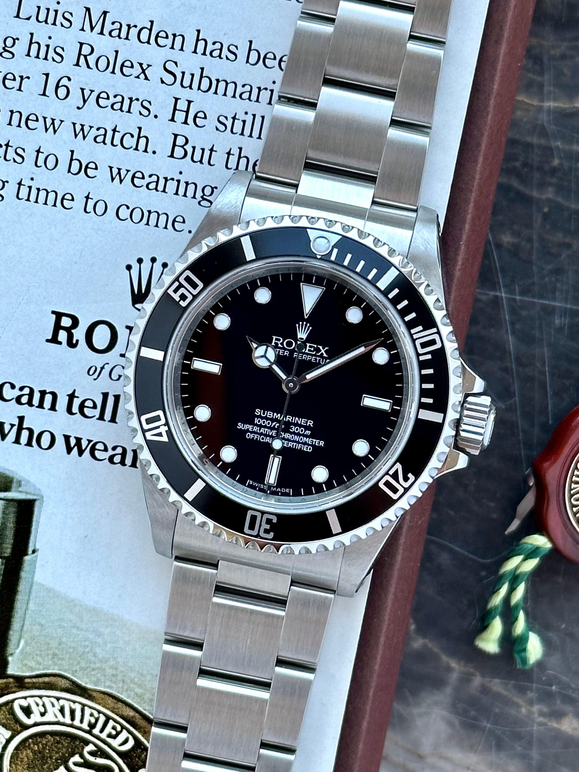 Rolex Submariner 14060M Black 2009 with original box and papers