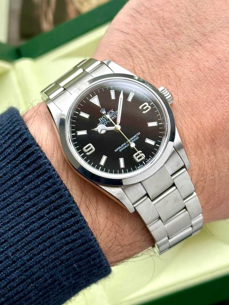 Wrist shot image for Rolex Explorer 1 "Engraved Rehaut" 114270 Black 2007 with original box and papers 2