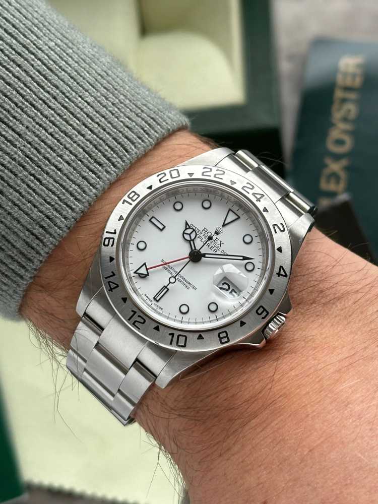 Wrist image for Rolex Explorer 2 "Engraved Rehaut" 16570T White 2008 with original box and papers