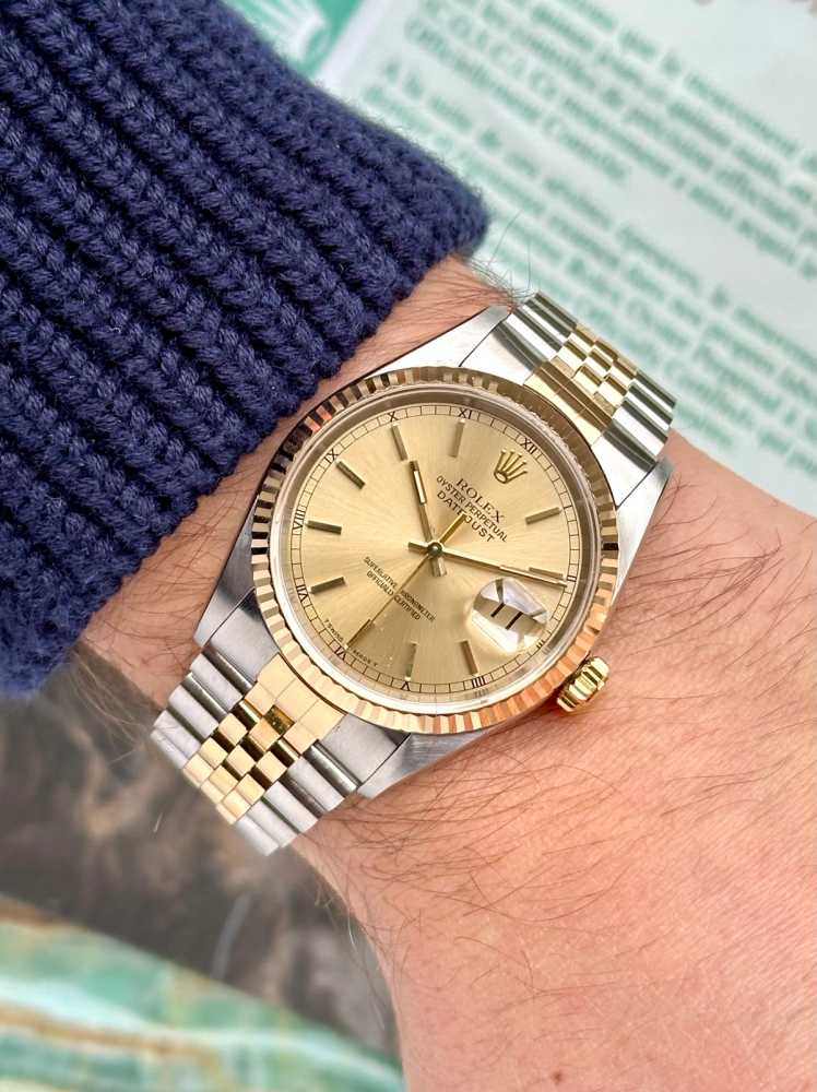 Wrist shot image for Rolex Datejust 16233 Gold 1997 with original box and papers
