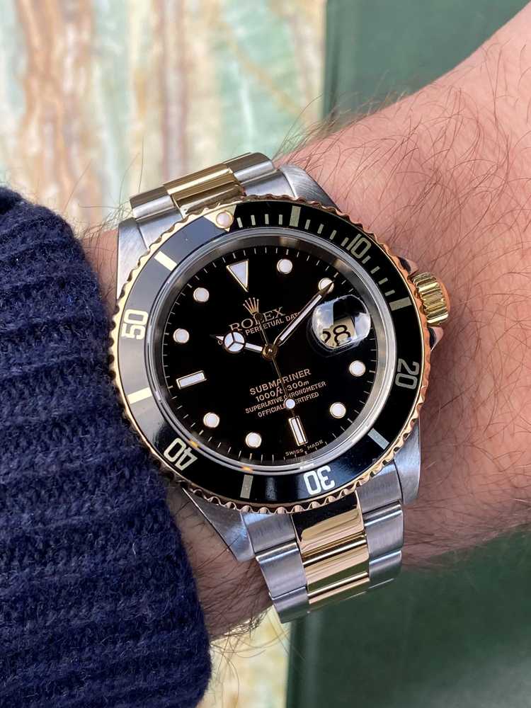 Wrist shot image for Rolex Submariner Date 16613 Black 2000 with original box and papers