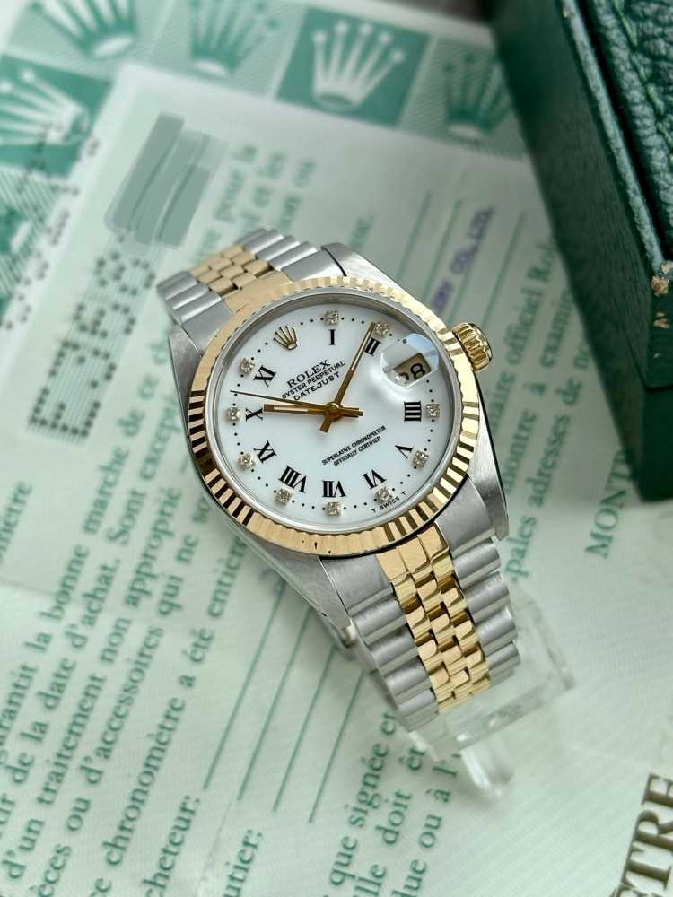 Wrist shot image for Rolex Midsize Datejust "Diamond" 68273G White 1990 with original box and papers