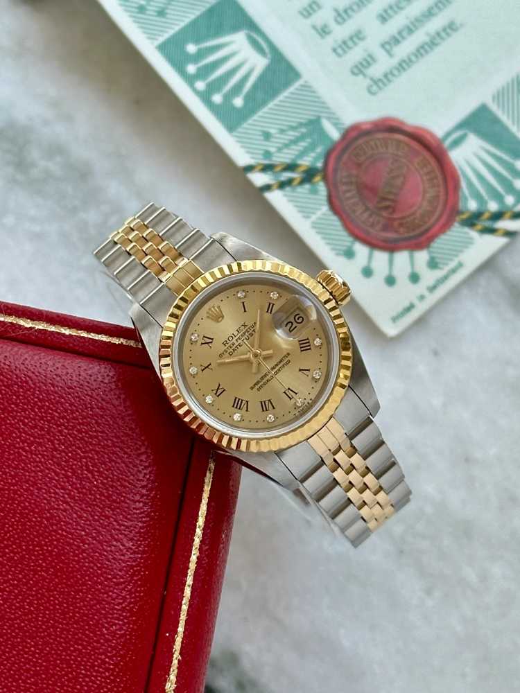 Wrist shot image for Rolex Lady-Datejust "Diamond" 69173G Gold 1989 with original box and papers