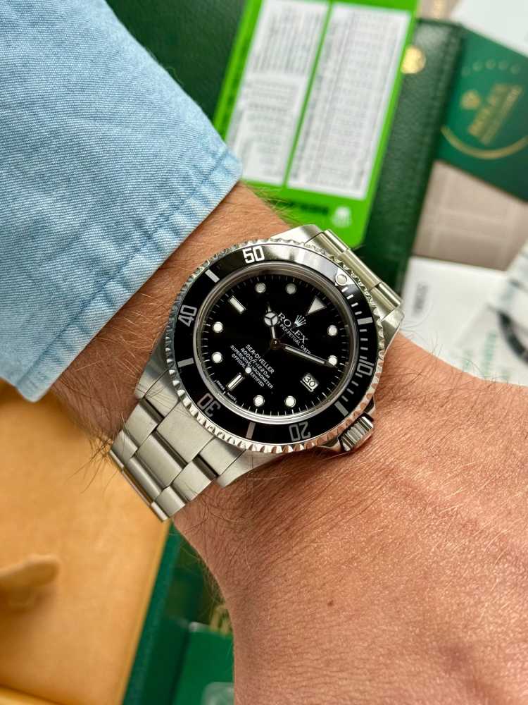 Wrist shot image for Rolex Sea-Dweller "Rolex Service" 16600 Black 2002 with original box and papers