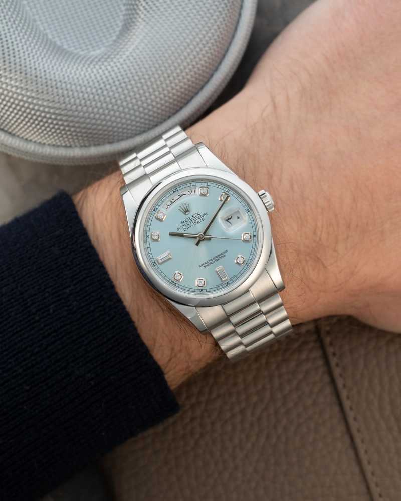 Wrist shot image for Rolex Day-Date Platinum Arabic 118206 Blue 2009 with original box and papers