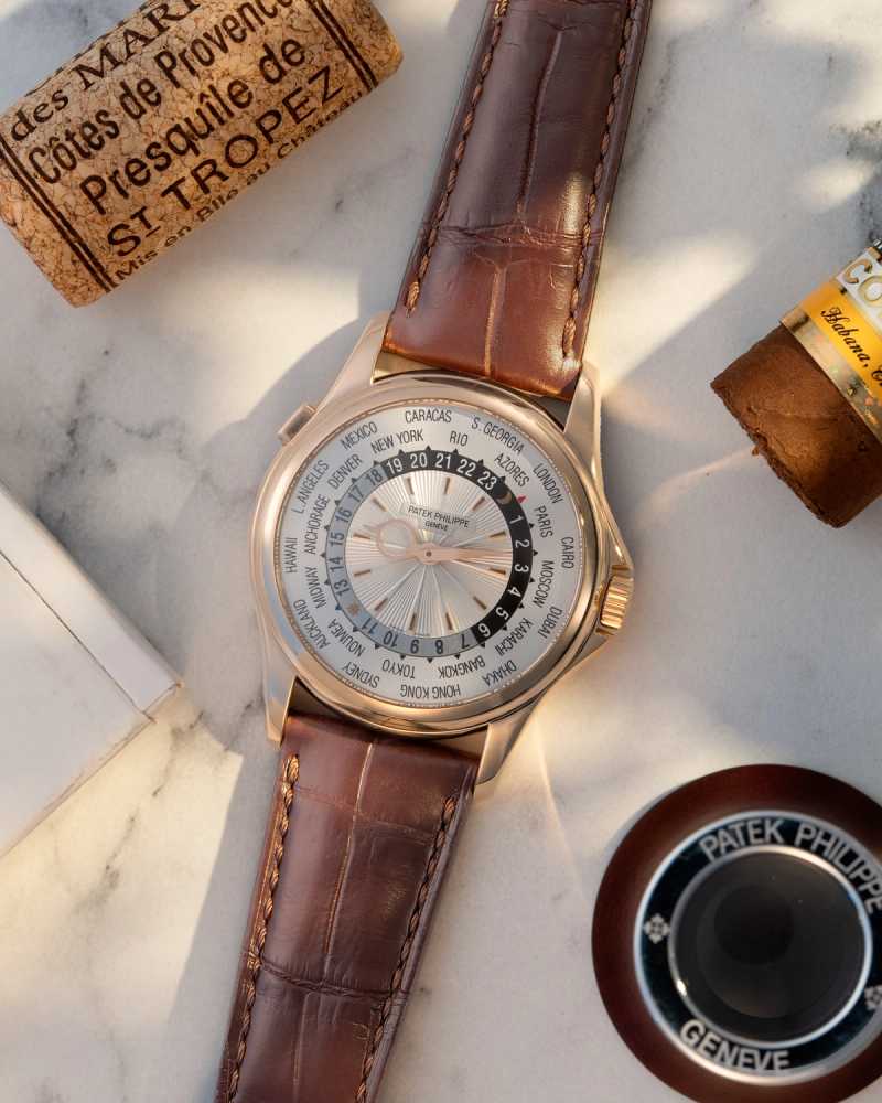Featured image for Patek Philippe World Time 5130R White 2011 with original box and papers